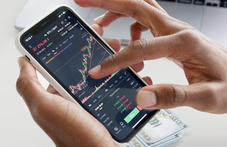 A cellphone with stock information showing